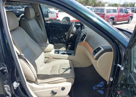 2013 Jeep Grand Cherokee Overland z USA, uszkodzony, nr VIN 1C4RJECT7DC533801